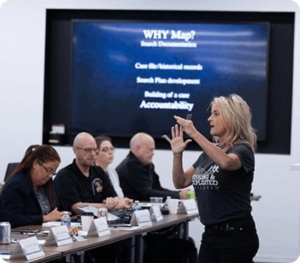 Team Adam investigators in a briefing