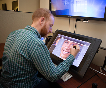 ncmec staff does age progression on computer